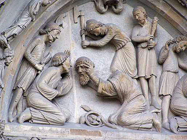 Отрубание головы Святому Дионисию. Задний портал аббатства Сен-Дени. Париж.